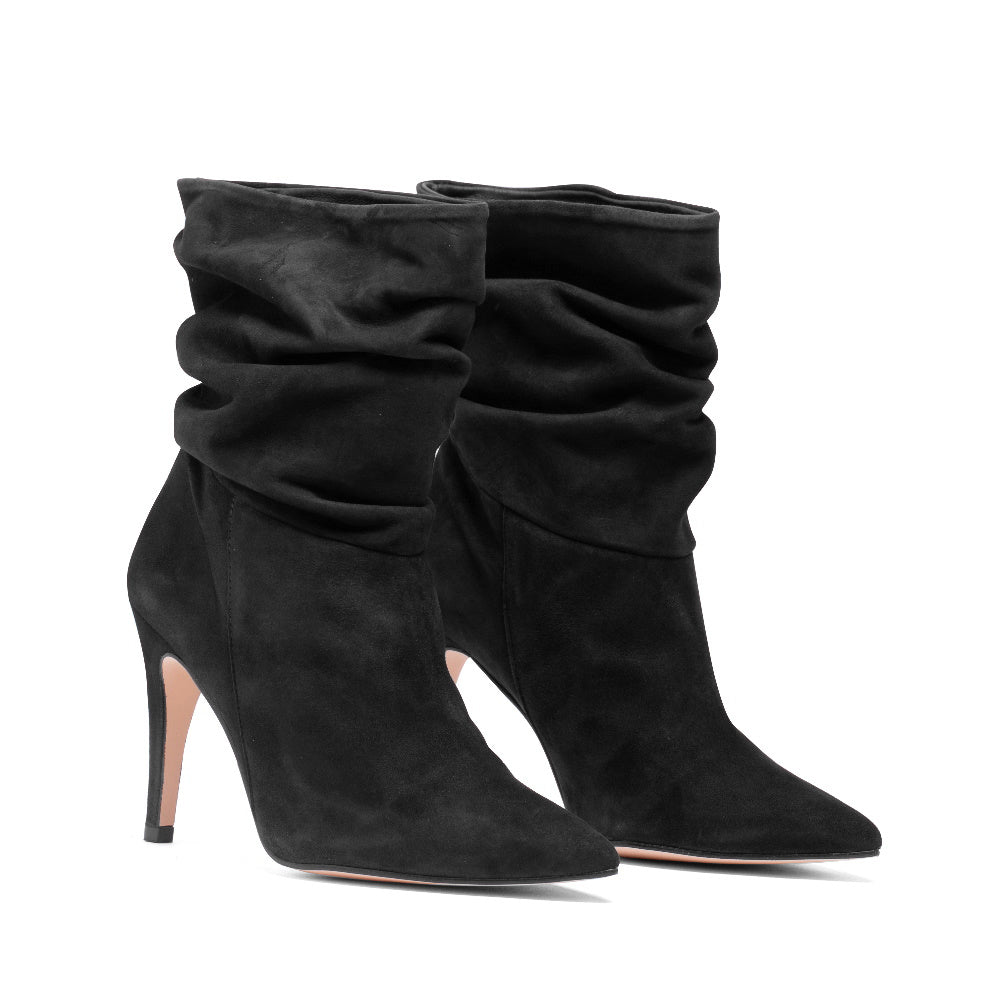 BOTIN INDIRA ANTE NEGRO